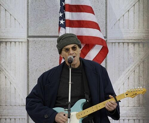 Singer James Taylor performs at the Lincoln Memorial We Are One concert.
