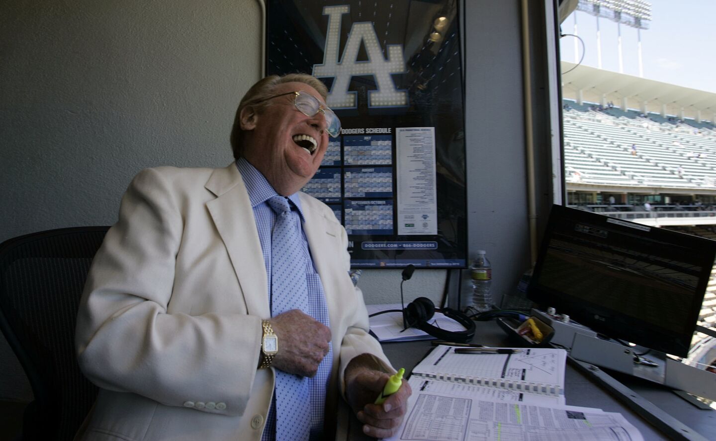 Announcer Vin Scully in his booth before a Dodgers–Reds game on Aug. 22, 2010.