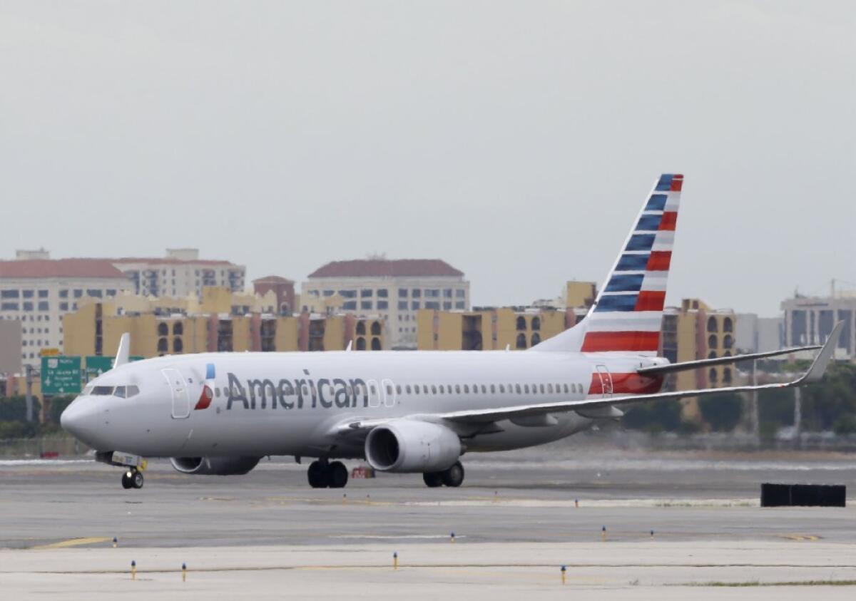 An American Airlines jet in Miami on Wednesday. The carrier posted sharply higher first-quarter profit Friday.