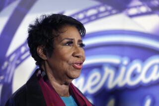 Aretha Franklin is interviewed after a taping for American Idol XIV at The Fillmore Detroit in Detroit, July 6, 2015. Five years after her death, the final wishes of the music superstar are still unsettled. The latest: an unusual trial next Monday to determine which handwritten will, including one found in couch cushions, will guide how her estate is handled. (AP Photo/Carlos Osorio_File)