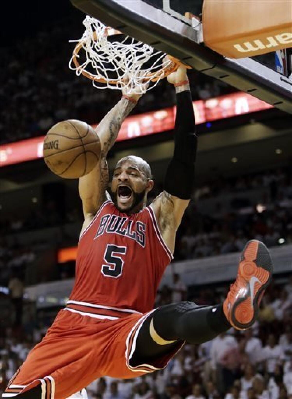 Chris died in my arms': NBA star Carlos Boozer on the murder that