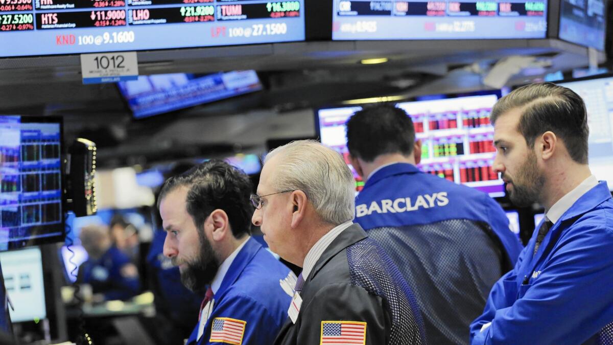 Stock traders work at the New York Stock Exchange.The temptation to get out of stocks during a recession can be costly. After every previous recession, stocks have eventually gone on to recover their losses — and then climb higher.