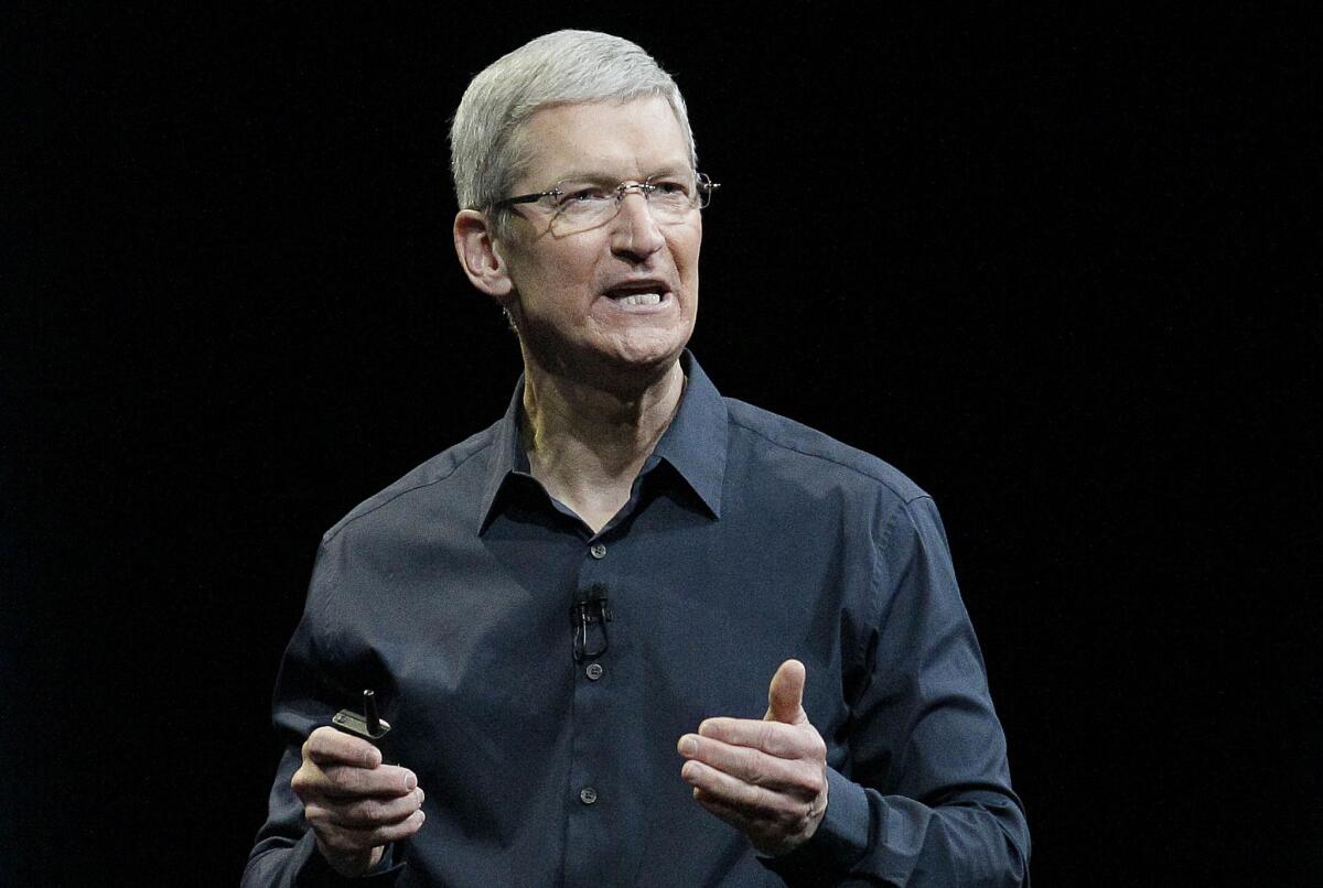 Apple CEO Tim Cook speaks at an event in San Francisco in June of 2014. The deadly attacks in Paris may soon reopen the debate over whether and how tech companies should let the government sidestep the data scrambling that shields everyday commerce and daily digital life alike. Cook has said that the trouble with that approach is that "there's no such thing as a backdoor for the good guys only."
