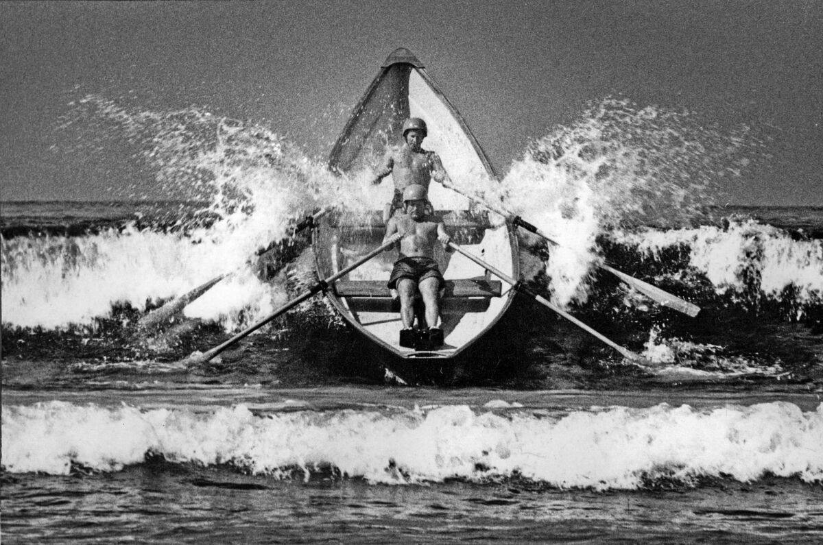 August 1968: Santa Monica lifeguards Mike Kent, front, and Capt. Jim Richards practice for a dory race at the upcoming 10-day Santa Monica Sports and Arts Festival.