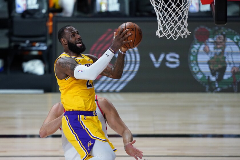 LeBron James shoots against the Toronto Raptors on Aug. 1.