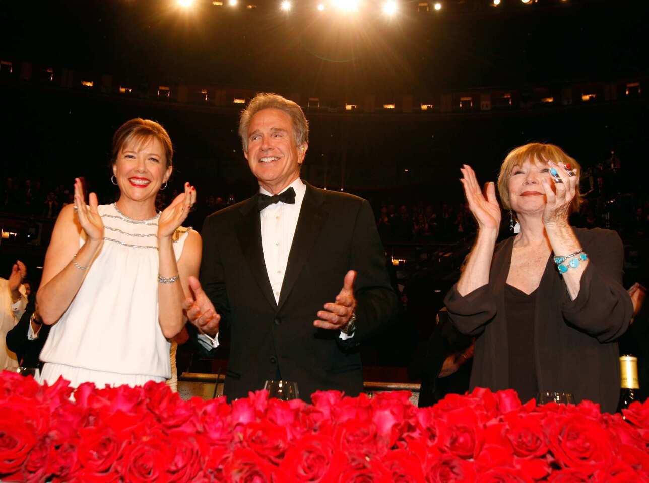 In 2012, Shirley MacLaine was awarded the American Film Institute's highest honor: the 40th Life Achievement Award. MacLaine's younger brother, Warren Beatty, received the AFI honor in 2008. At left is Beatty's wife, actress Annette Bening.