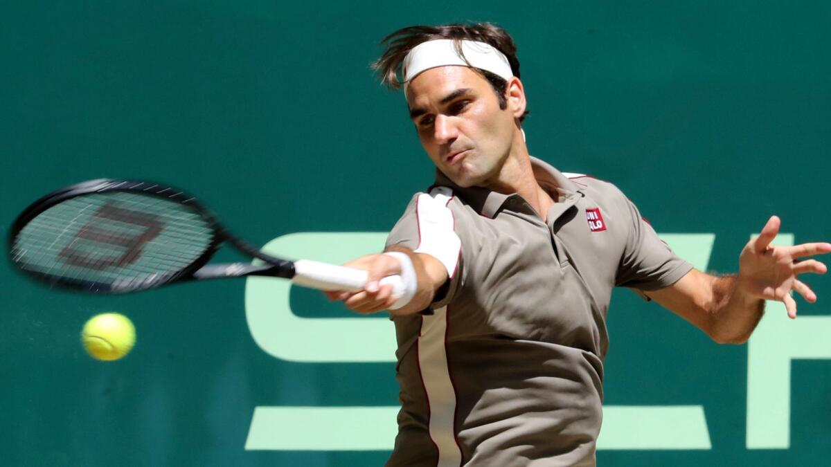 Roger Federer returns a shot against David Goffin at the Noventi Open Halle Germany, on June 23, 2019.