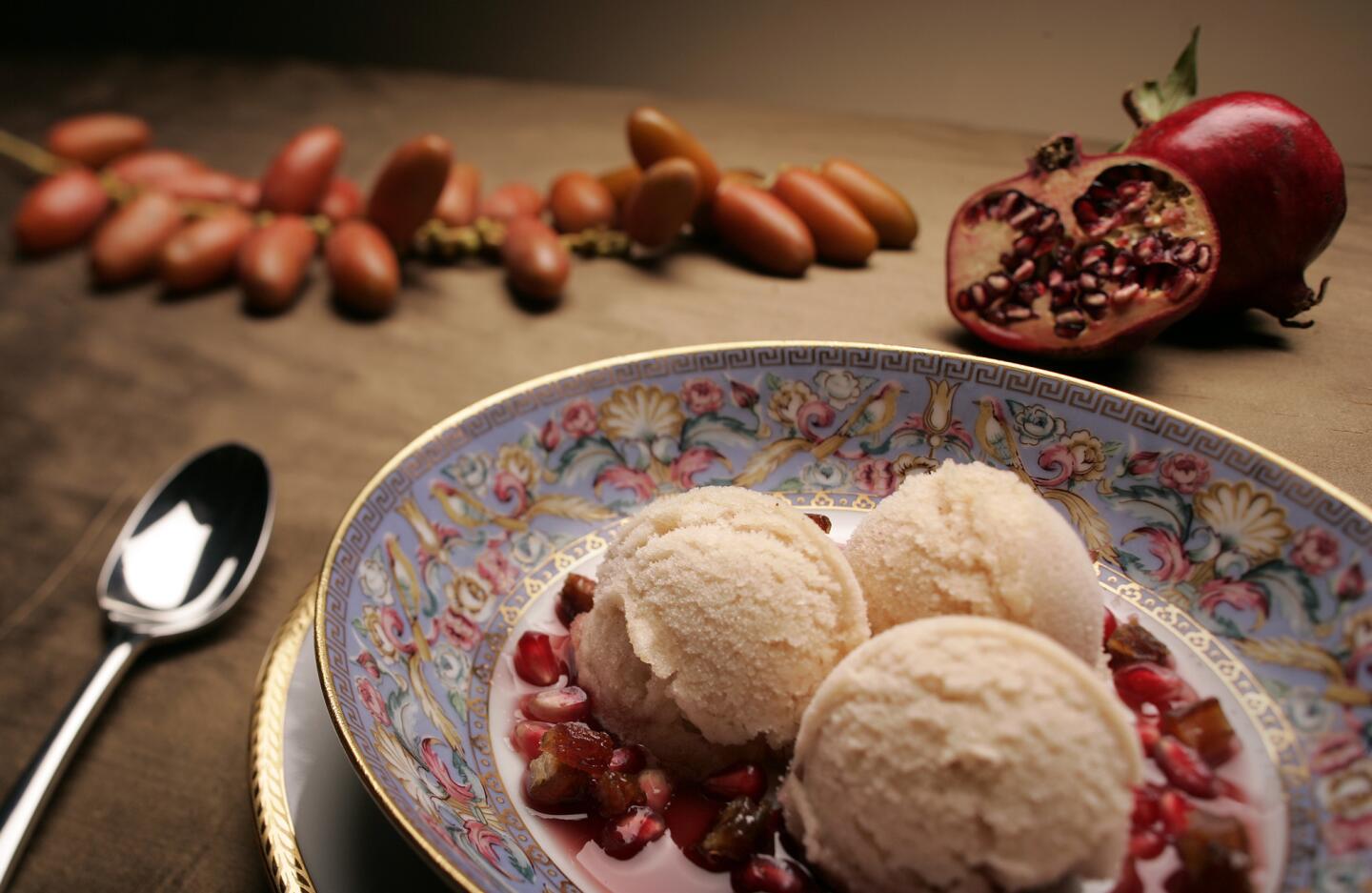 Apple and honey sorbet with pomegranate sauce. Recipe