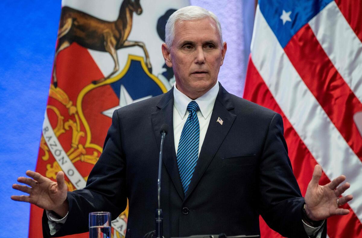 Vice President Mike Pence speaks at a joint news conference with Chilean President Michelle Bachelet in Santiago on Wednesday.