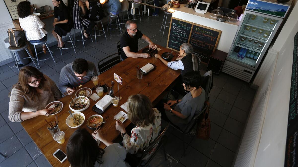 Diners at a restaurant in Los Angeles on March 23, 2016.