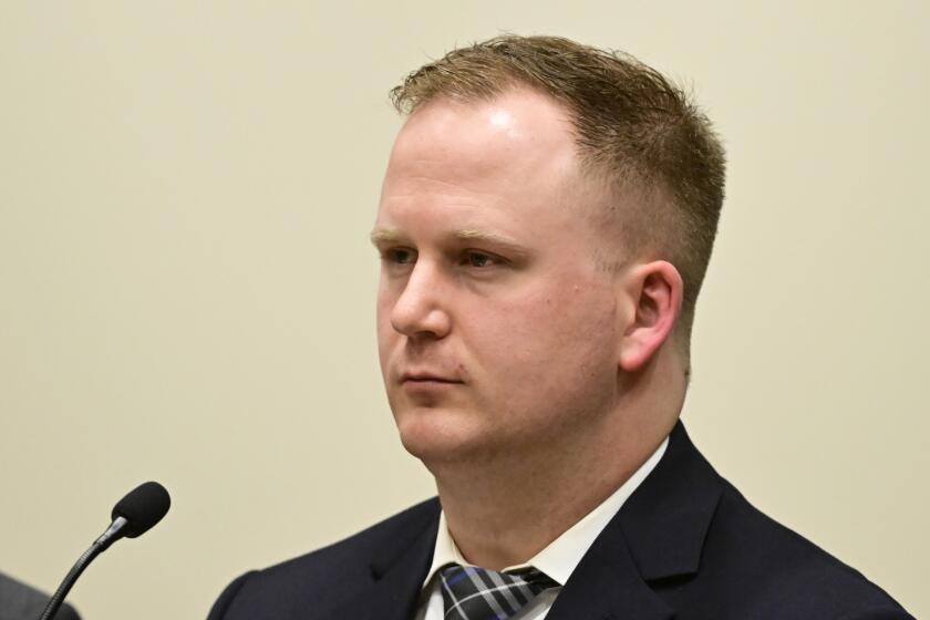 FILE - Aurora, Colo., police officer Nathan Woodyard attends an arraignment hearing after being charged in the 2019 death of Elijah McClain, Jan. 20, 2023, at the Adams County Justice Center in Brighton, Colo. Closing arguments are scheduled Friday, Nov. 3, in the trial of the police officer charged with manslaughter and criminally negligent homicide in the death of McClain, a 23-year-old Black man stopped as he walked home from the store after someone reported that he was suspicious. (Andy Cross/The Denver Post via AP, File)