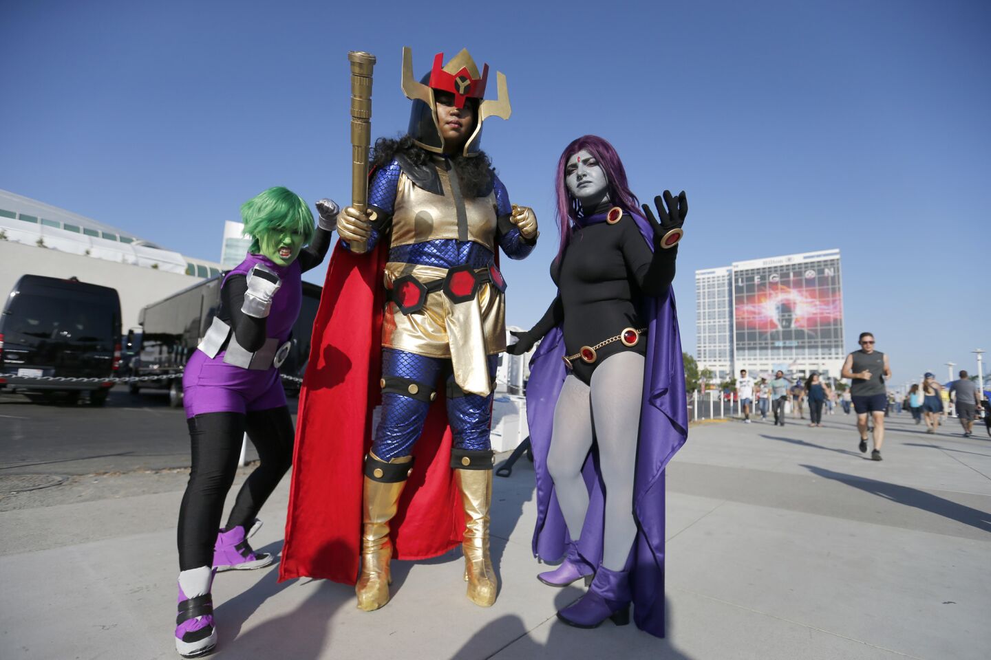 Kenny Letelier, from left, of Las Vegas, as Beast Boy, Jazmine Boatman as Big Barda, and Billy Scholz of New York as Raven.