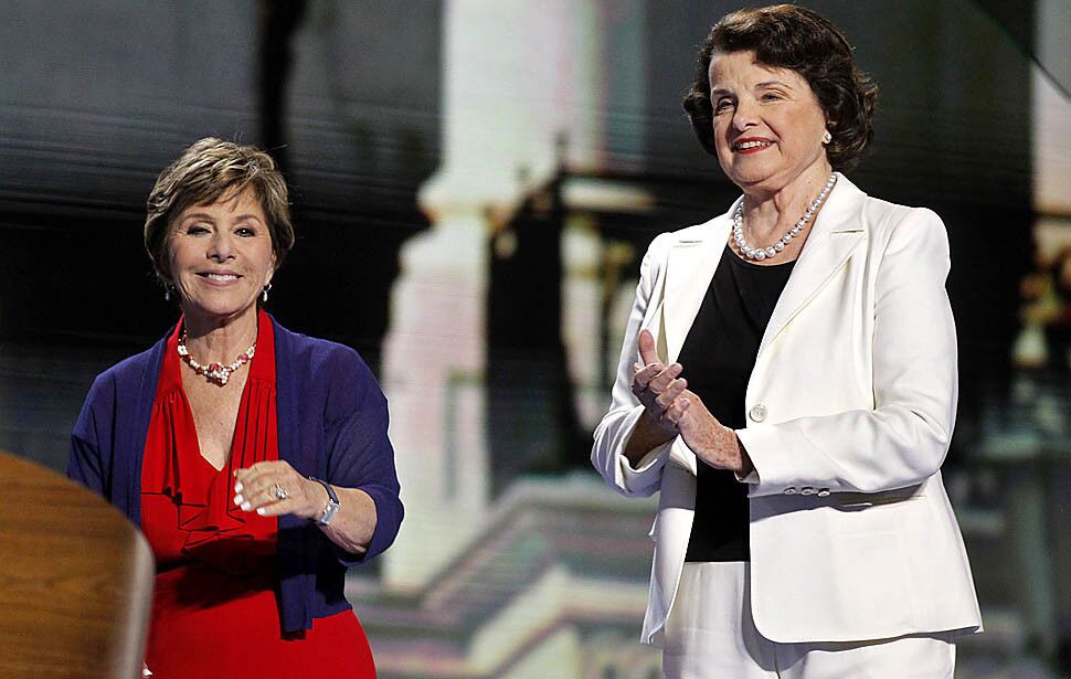 California Senators Barbara Boxer, left, and Diane Feinstein on stage at the Democratic National Convention 2012 at Time Warner Cable Arena September 5 2012 in Charlotte.
