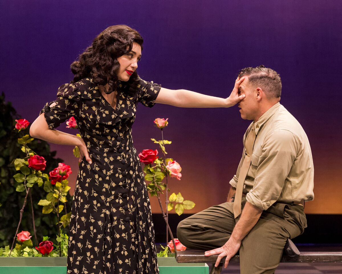 A woman in a floral-print dress tells a uniformed man to talk to the hand
