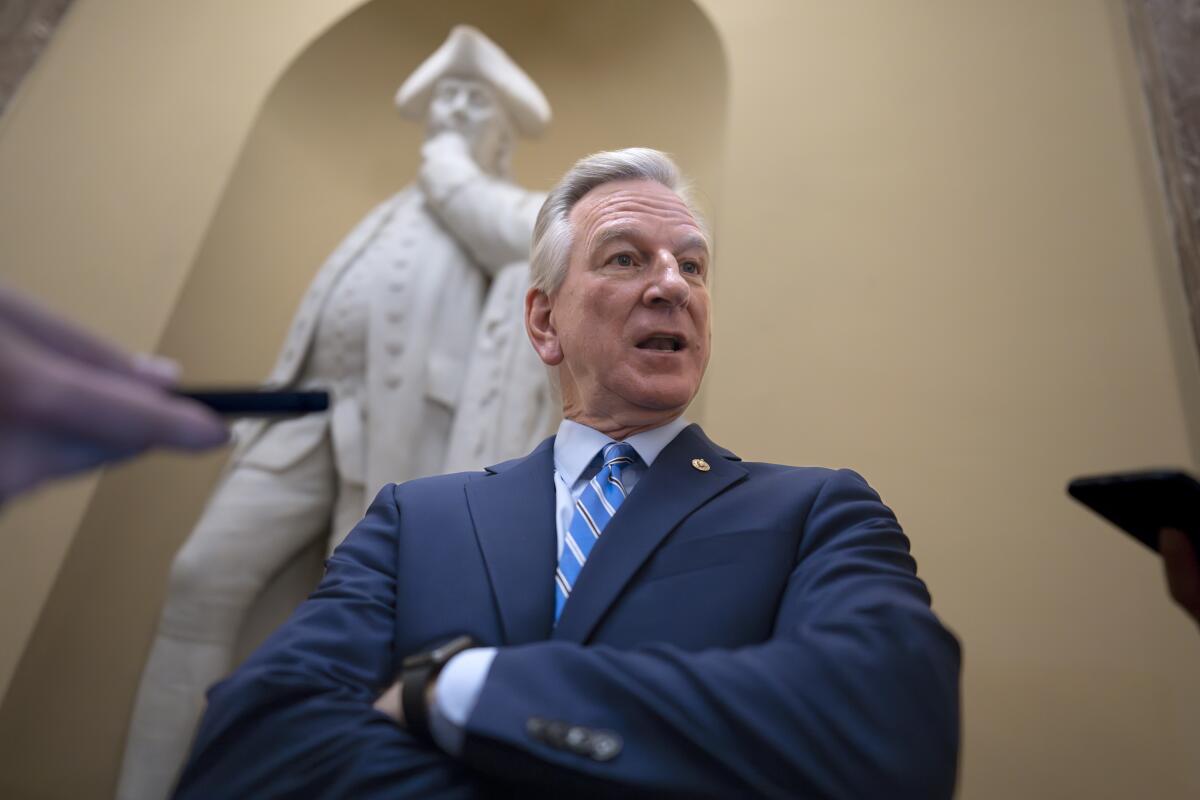Sen. Tommy Tuberville (R-Ala.) talks to reporters at the Capitol in Washington on May 16. 