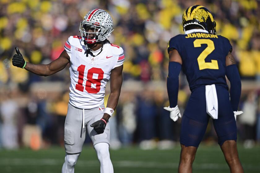Ohio State wide receiver Marvin Harrison Jr. lines up during the first half of an NCAA college football game against Michigan, Saturday, Nov. 25, 2023, in Ann Arbor, Mich. Michigan won 30-24. (AP Photo/David Dermer)