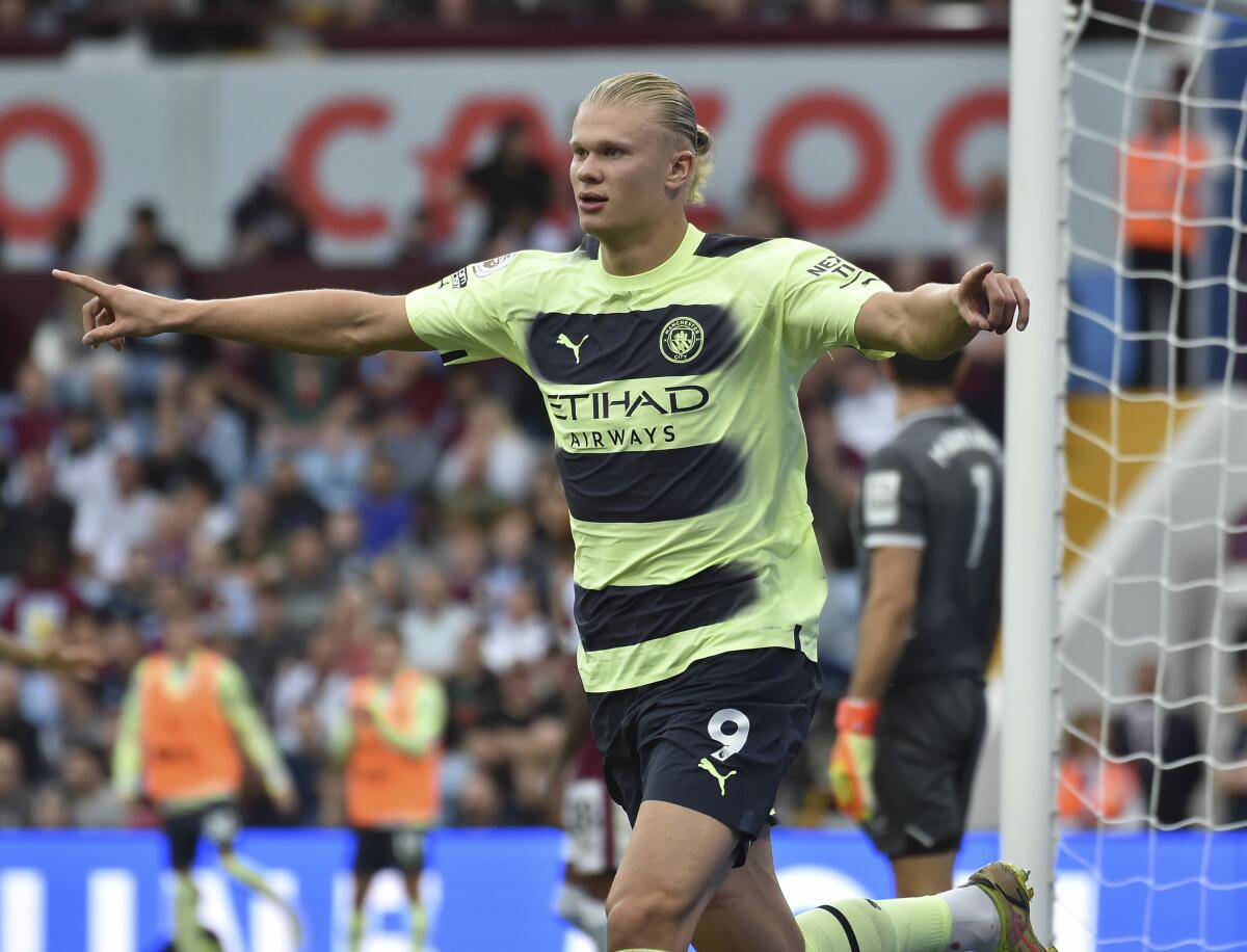 Erling Haaland celebrates his goal against Aston Villa.