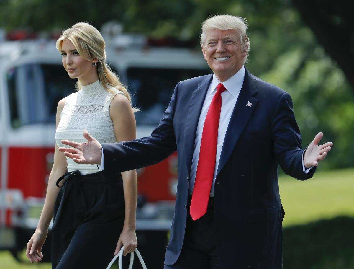 Ivanka Trump and President Trump on the South Lawn of the White House