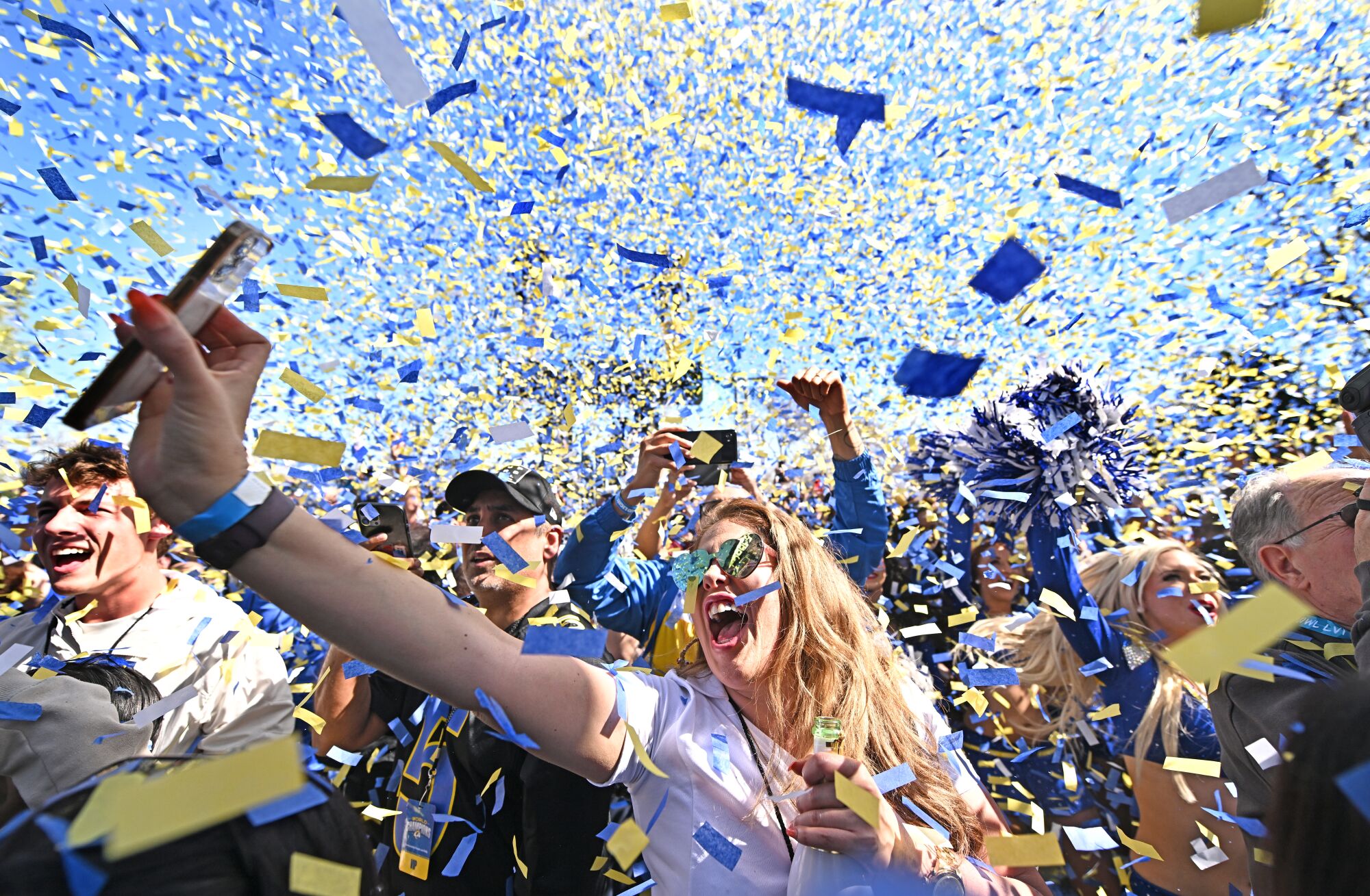 Rams fans celebrate during the parade and rally in Los Angeles.