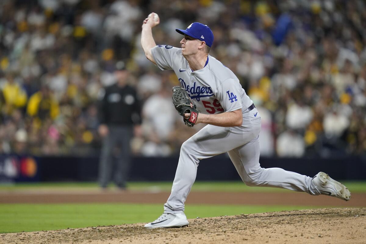 Dodgers relief pitcher Evan Phillips delivers against the San Diego Padres in the NLDS last year.