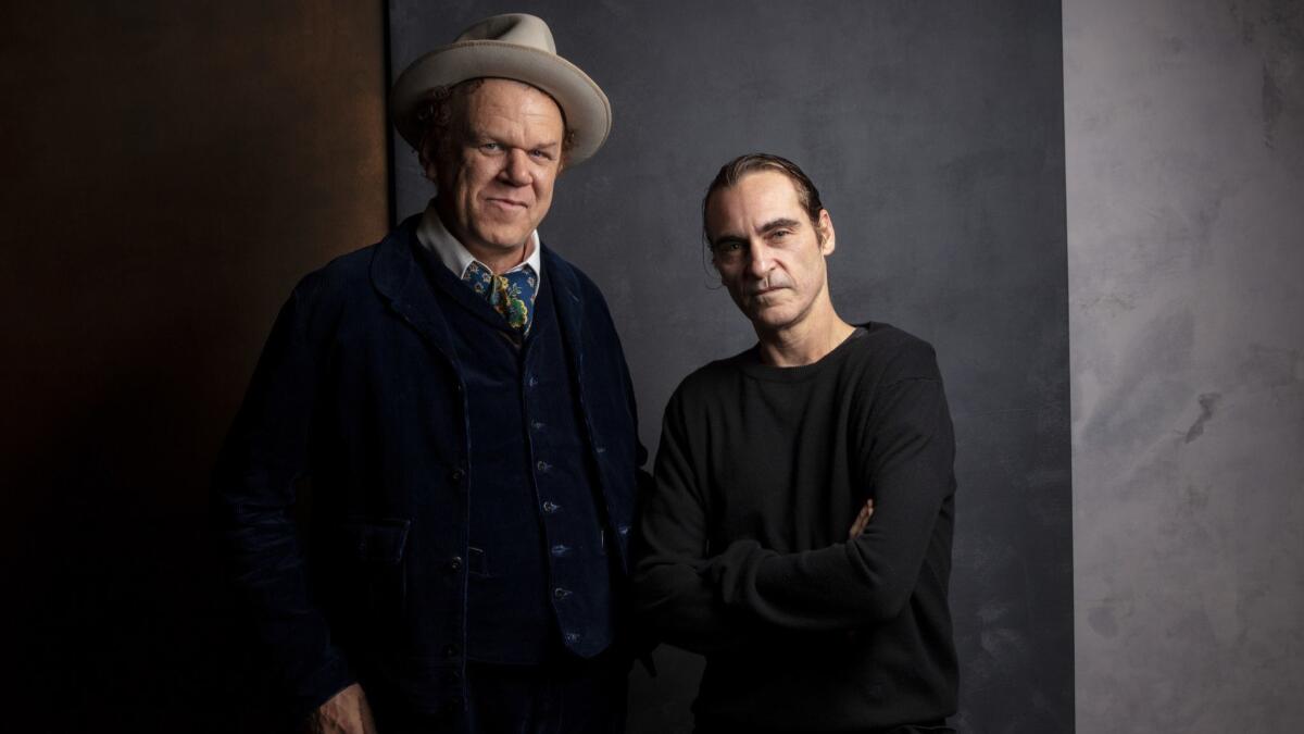 John C. Reilly, left, and Joaquin Phoenix star opposite each other in Jacques Audiard's "The Sisters Brothers."