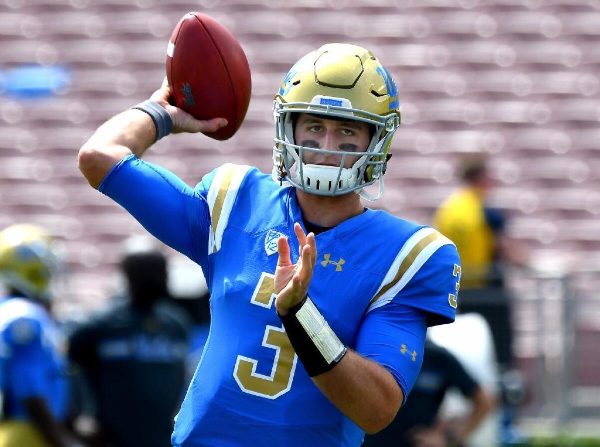 UCLA quarterback Josh Rosen warms up before a game against Hawaii on Sept. 9 at the Rose Bowl.