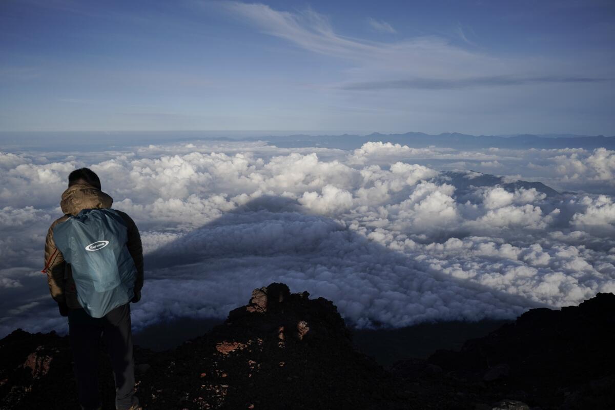 In August, the shadow of Japan's Mt. Fuji is seen.