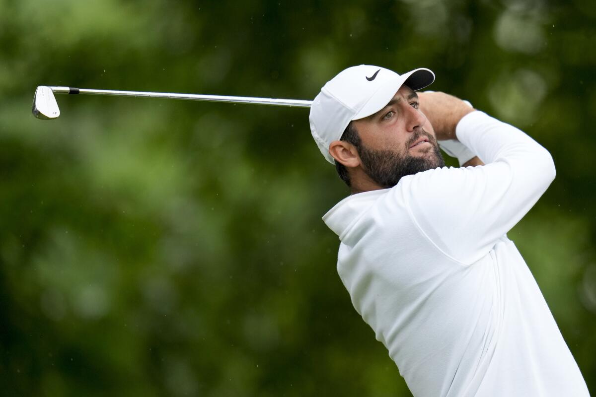 Scottie Scheffler watches his tee shot on the 11th hole during the second round of the PGA Championship.