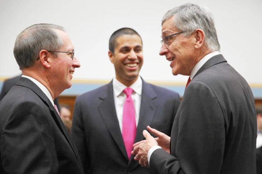House Judiciary Committee Chairman Bob Goodlatte (R-Va.), from left, FCC Commissioner Ajit Pai and FCC Chairman Tom Wheeler talk before a hearing in March on Internet regulation.