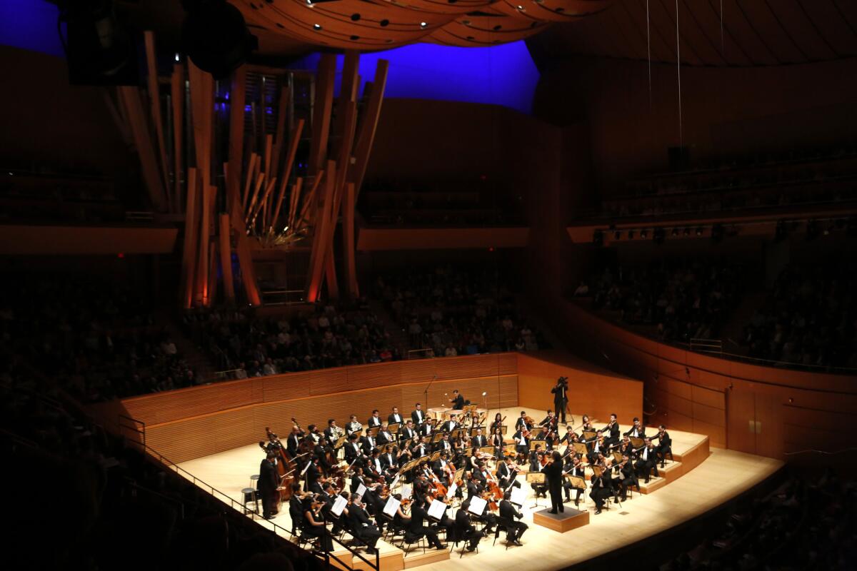 Gustavo Dudamel conducts the Simon Bolivar Symphony Orchestra of Venezuela for "Immortal Beethoven: Symphonies 3 & 4 at the Walt Disney Concert Hall in downtown Los Angeles on October 2, 2015.