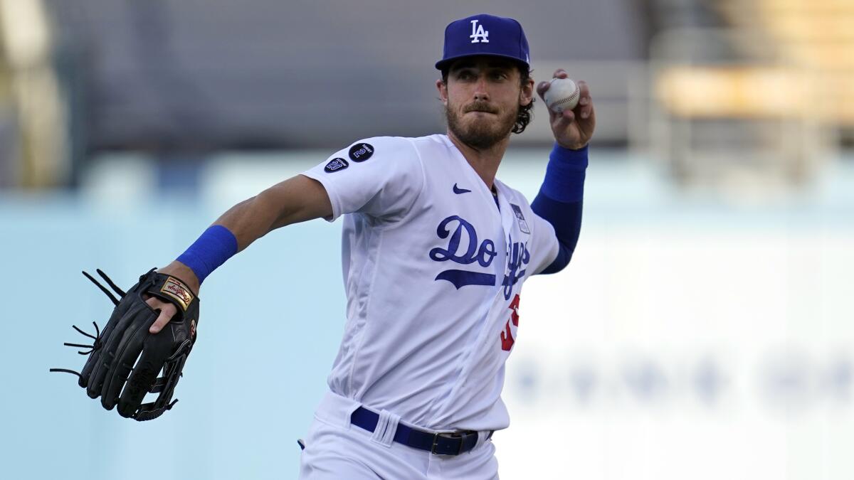 Dodgers center fielder Cody Bellinger warms up before a game against the St. Louis Cardinals on June 2.