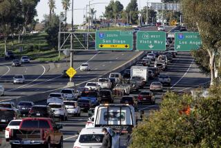 Westbound traffic on state Route 78 backs up at the entrance ramp to southbound I-5 Monday.