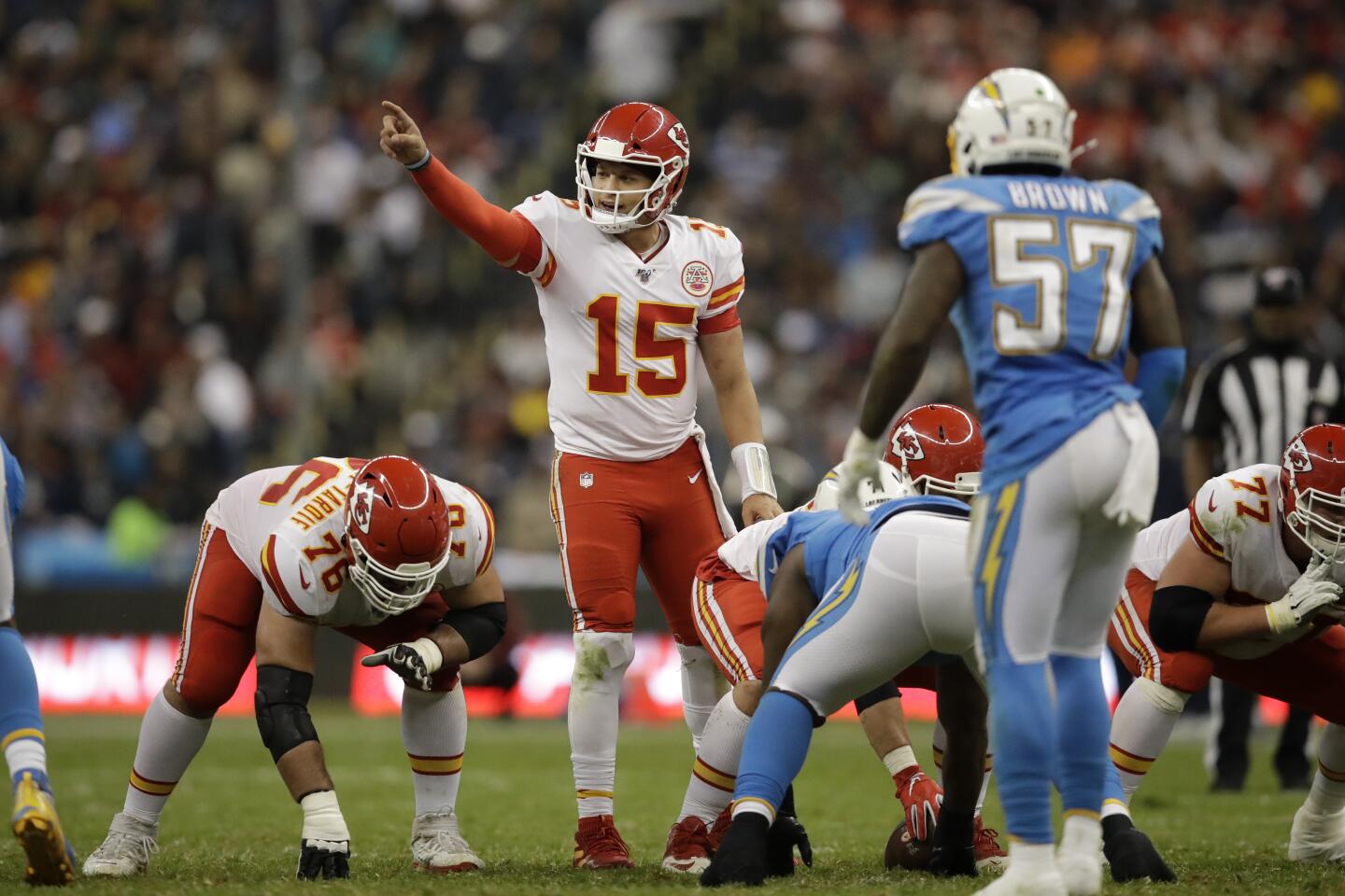 Chiefs quarterback Patrick Mahomes motions before a play during a game against the Chargers on Nov. 18.