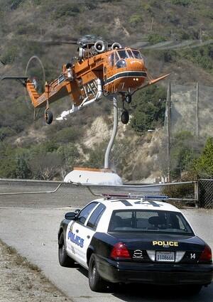 An Erickson Air-Crane takes on a load of water at Stough Park in Burbank.