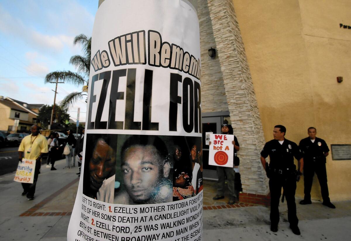 A flier with Ezell Ford Jr.'s image hangs on a post outside Paradise Baptist Church in South Los Angeles. Mayor Eric Garcetti ordered the LAPD to release the results of an autopsy on Ford, who was killed by police.