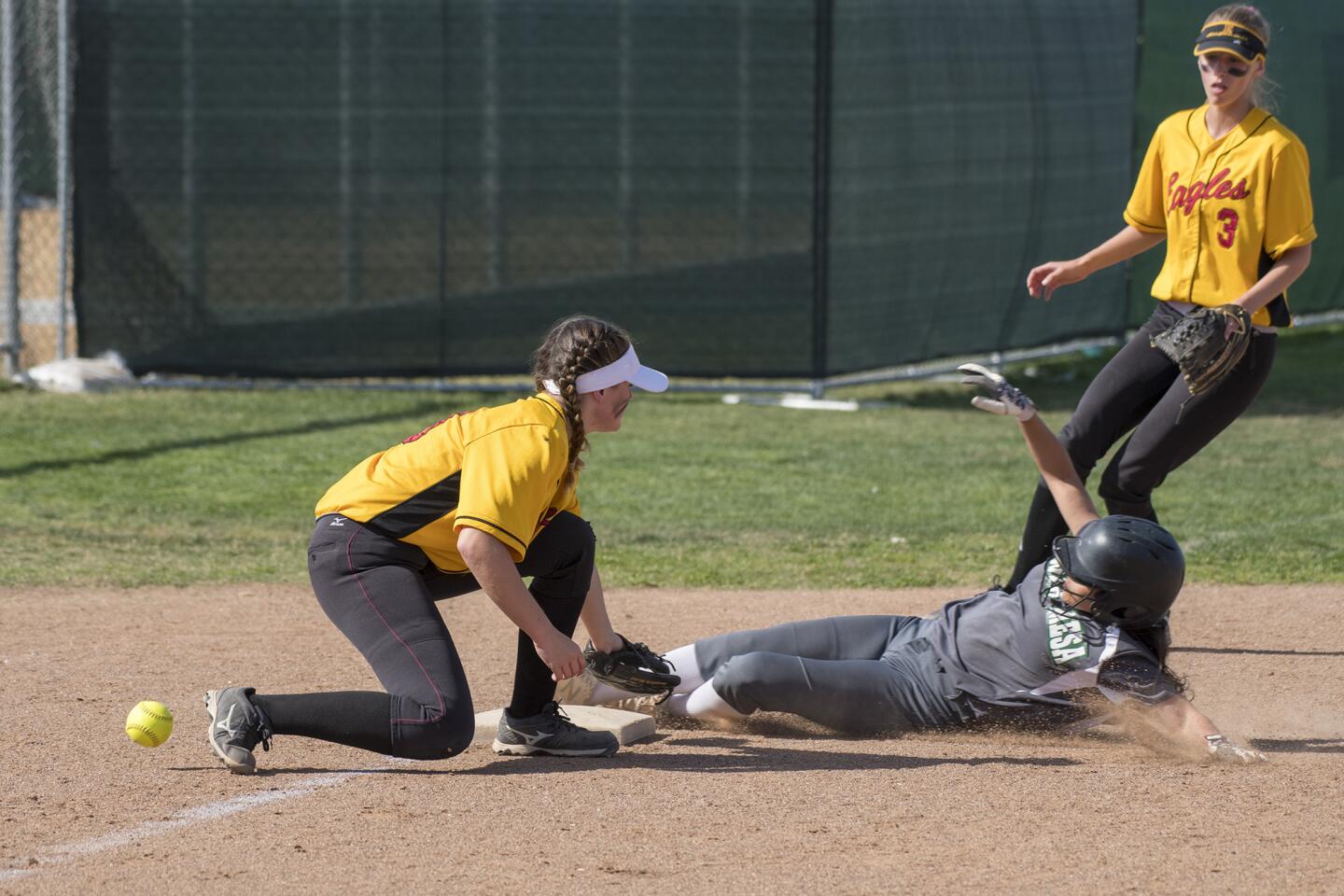 Etancia vs. Costa Mesa in a girls' softball game