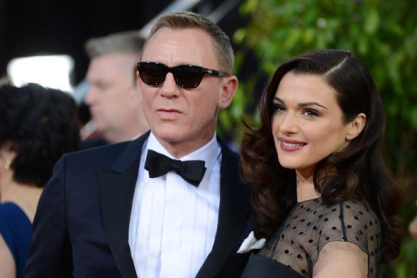 Daniel Craig and his wife Rachel Weisz arrive at the Golden Globes.