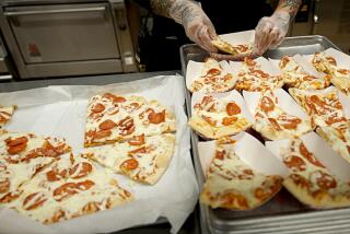 Pizza being prepped for lunch at Garfield High School