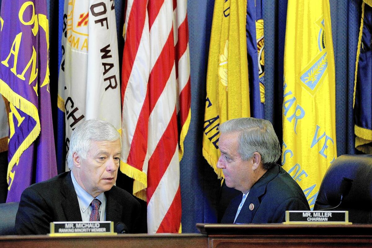 Chairman Jeff Miller (R-Fla.), right, and Rep. Michael H. Michaud (D-Maine) talk before a meeting of the House Veterans Affairs Committee. The panel approved a subpoena compelling VA officials to appear at a hearing.
