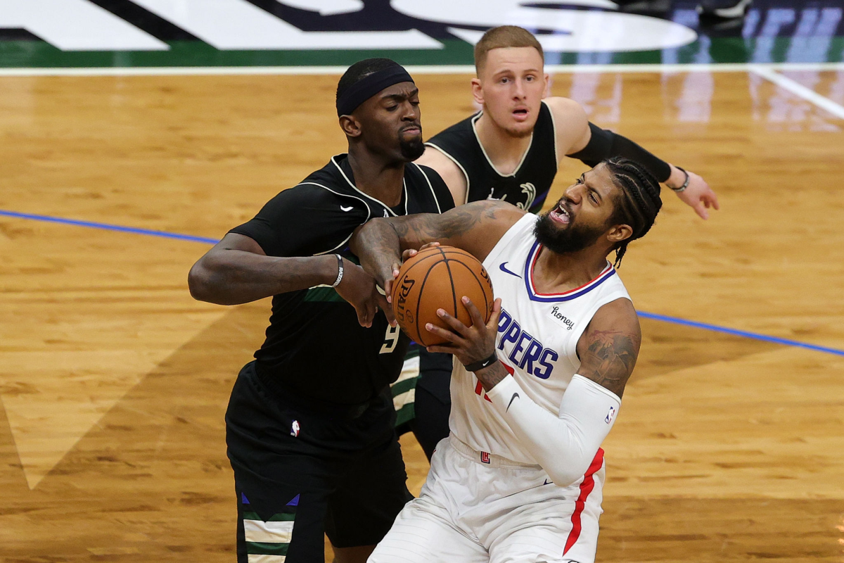 George lifts Clippers over Warriors, Giannis triple-double fuels