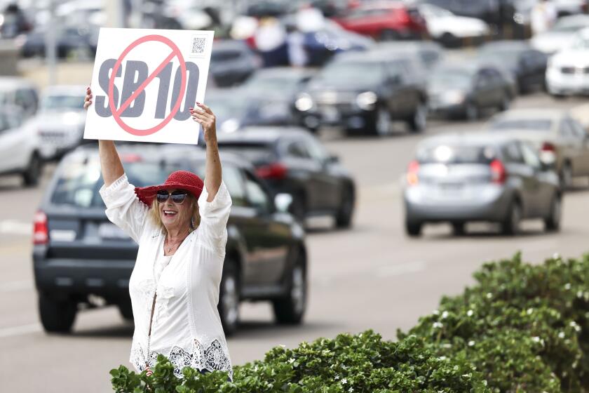 essay about yourself in pandemic San Diego, CA - July 29: Wendy Marshall, of San Diego, raises a sign against Senate Bill 10 near Ulric Street on Saturday, July 29, 2023 in San Diego, CA. (Meg McLaughlin / The San Diego Union-Tribune)