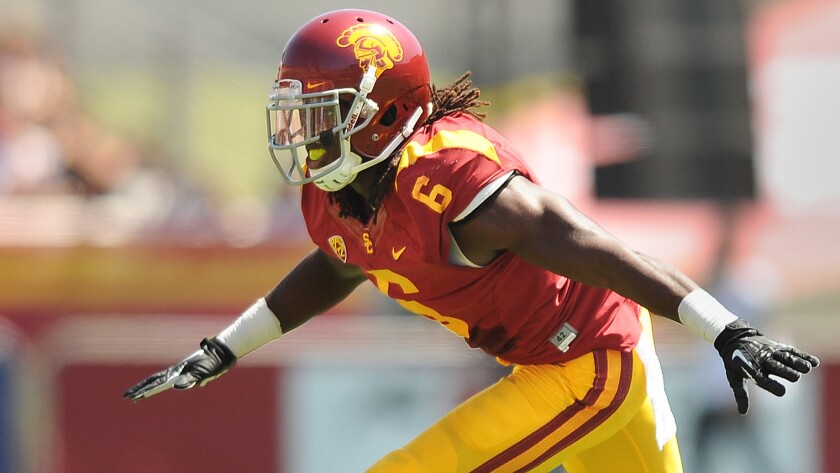 USC's Josh Shaw celebrates after recording a tackle against Boston College in September 2013.
