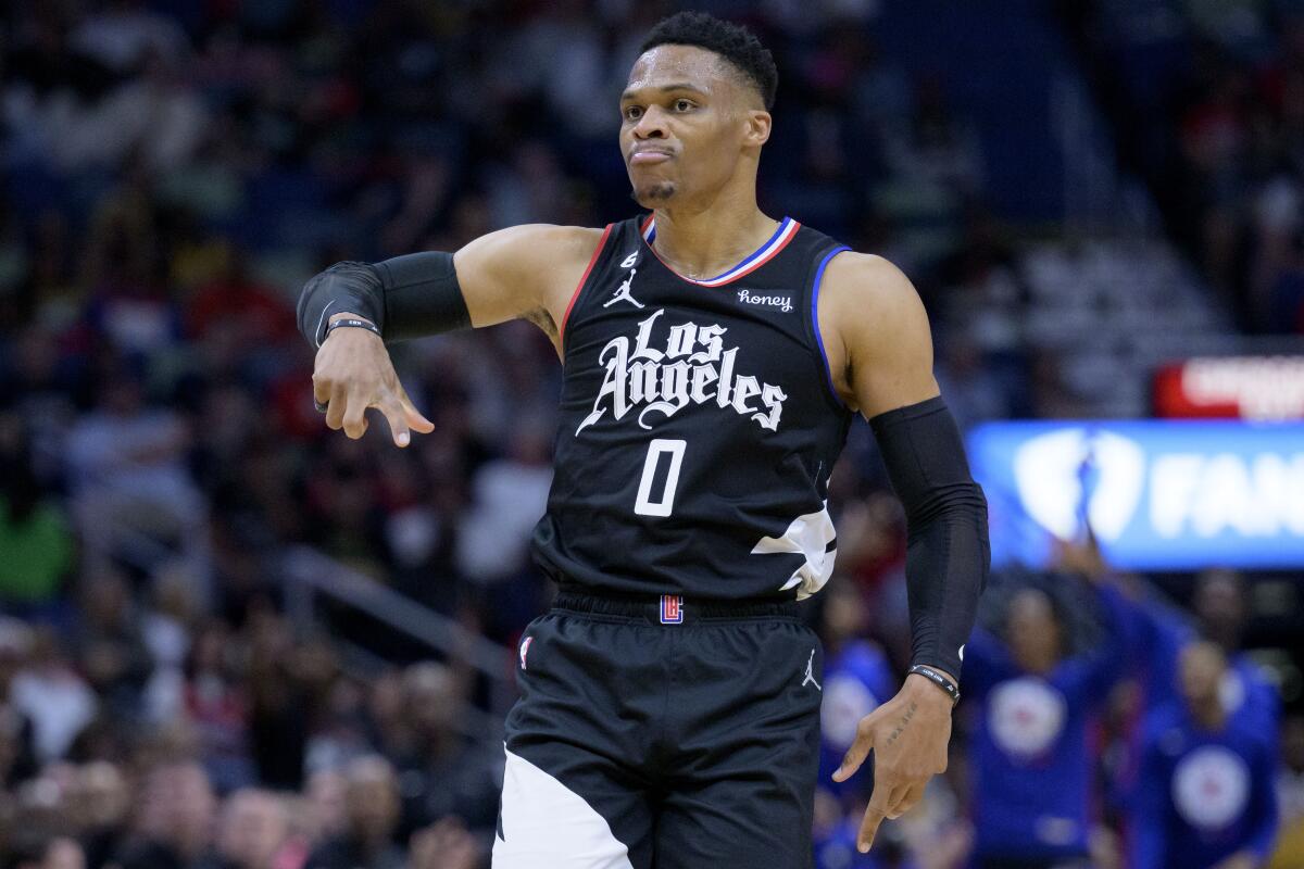 Clippers guard Russell Westbrook (0) signals after a sinking a three-pointer against the New Orleans Pelicans in April.