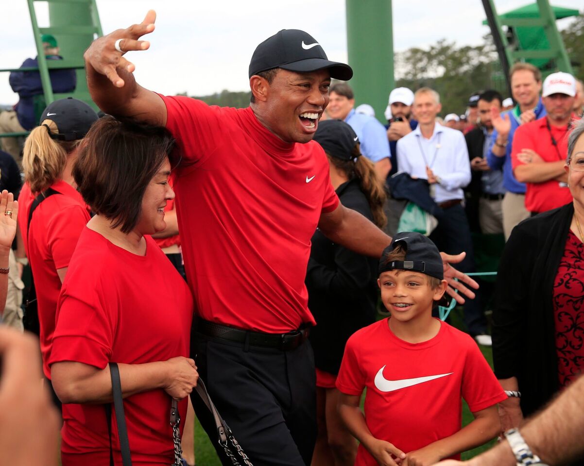 Tiger Woods celebrates with family after winning the 2019 Masters Tournament at the Augusta National Golf Club in Augusta, Ga.