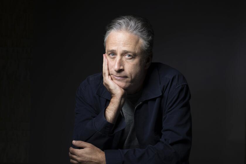 FILE - In this Nov. 7, 2014 file photo, Jon Stewart poses for a portrait in New York. Stewart directed the comedy "Irresistible," starring Rose Byrne and fellow "The Daily Show with Jon Stewart" alum, Steve Carell. (Photo by Victoria Will/Invision/AP, File)