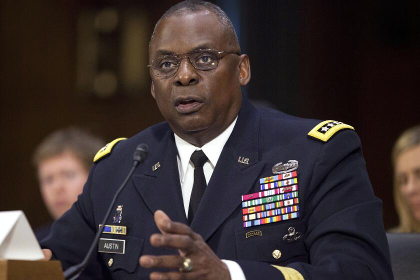 FILE - In this Sept. 16, 2015, photo, U.S. Central Command Commander Gen. Lloyd Austin III, testifies on Capitol Hill in Washington. Biden will nominate retired four-star Army general Lloyd J. Austin to be secretary of defense. That's according to three people familiar with the decision who spoke on condition of anonymity because the selection hadn't been formally announced. (AP Photo/Pablo Martinez Monsivais, File)