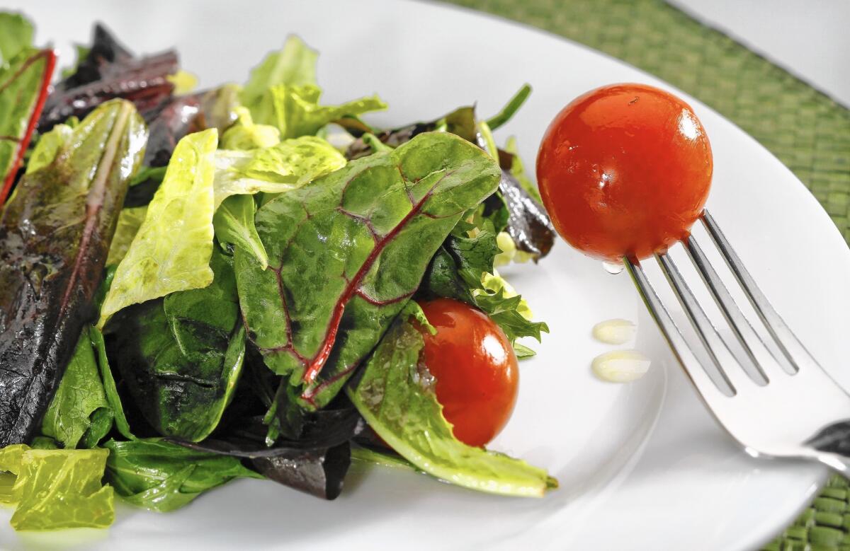 Professor Traci Mann recommends eating a salad or vegetable before a meal as a way to eat less and lose weight.