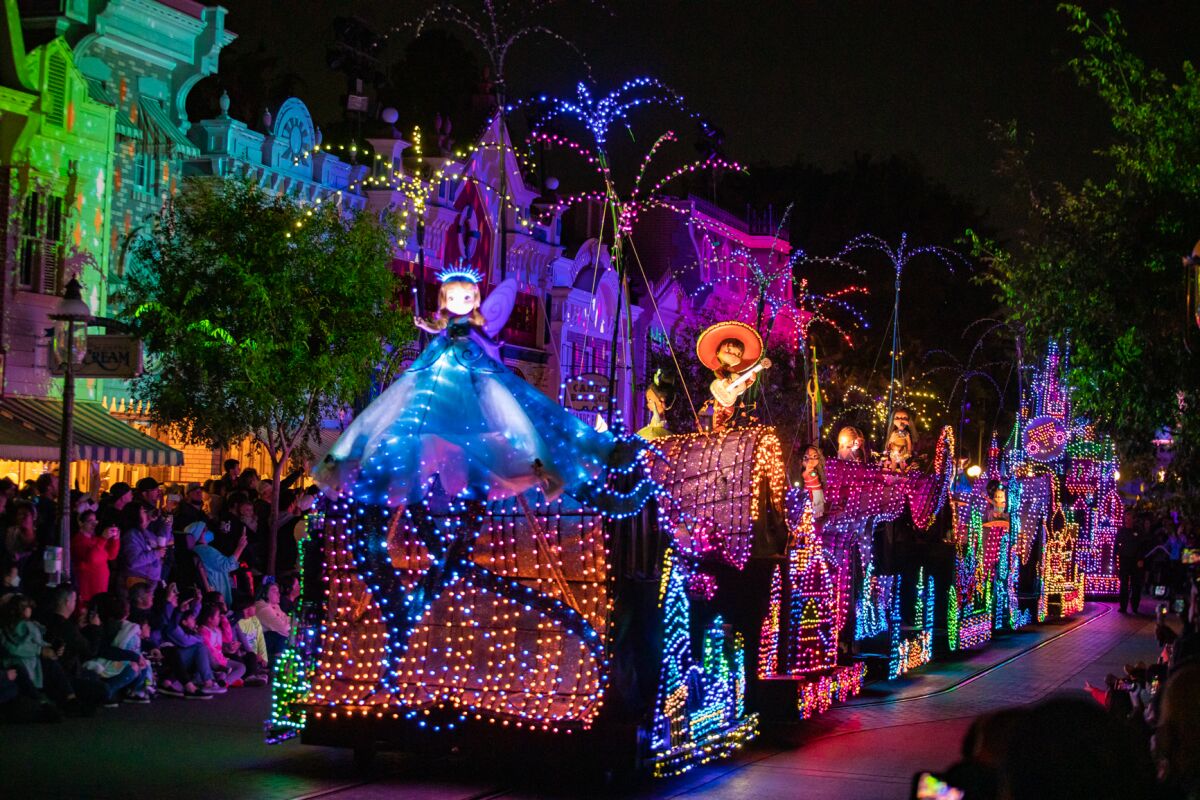 Illuminated parade float at night 