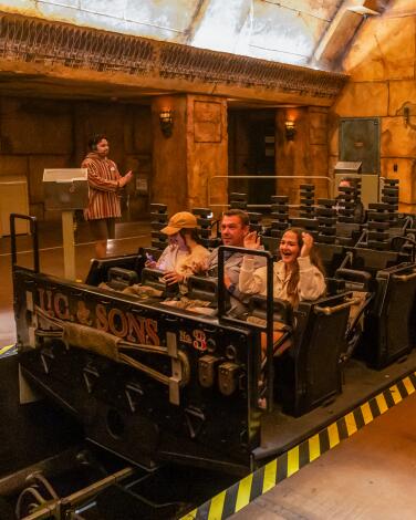 Guests on a jeep-like tram for Revenge of the Mummy: The Ride
