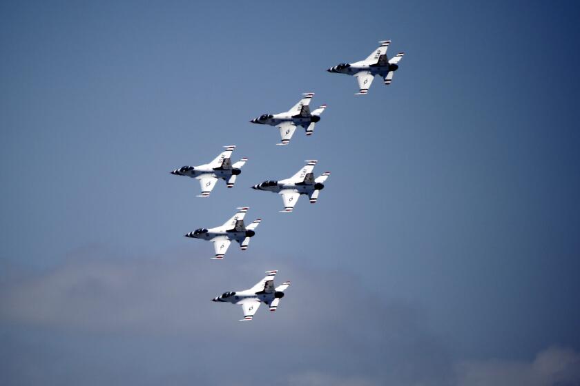 The United States Air Force Thunderbirds do a fly-by to salute the state's COVID-19 first responders, seen from Hoag Memorial Hospital Presbyterian in Newport Beach on Friday, May 15, 2020.
